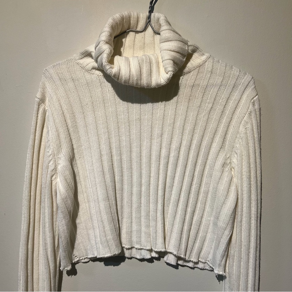 White turtleneck sweater